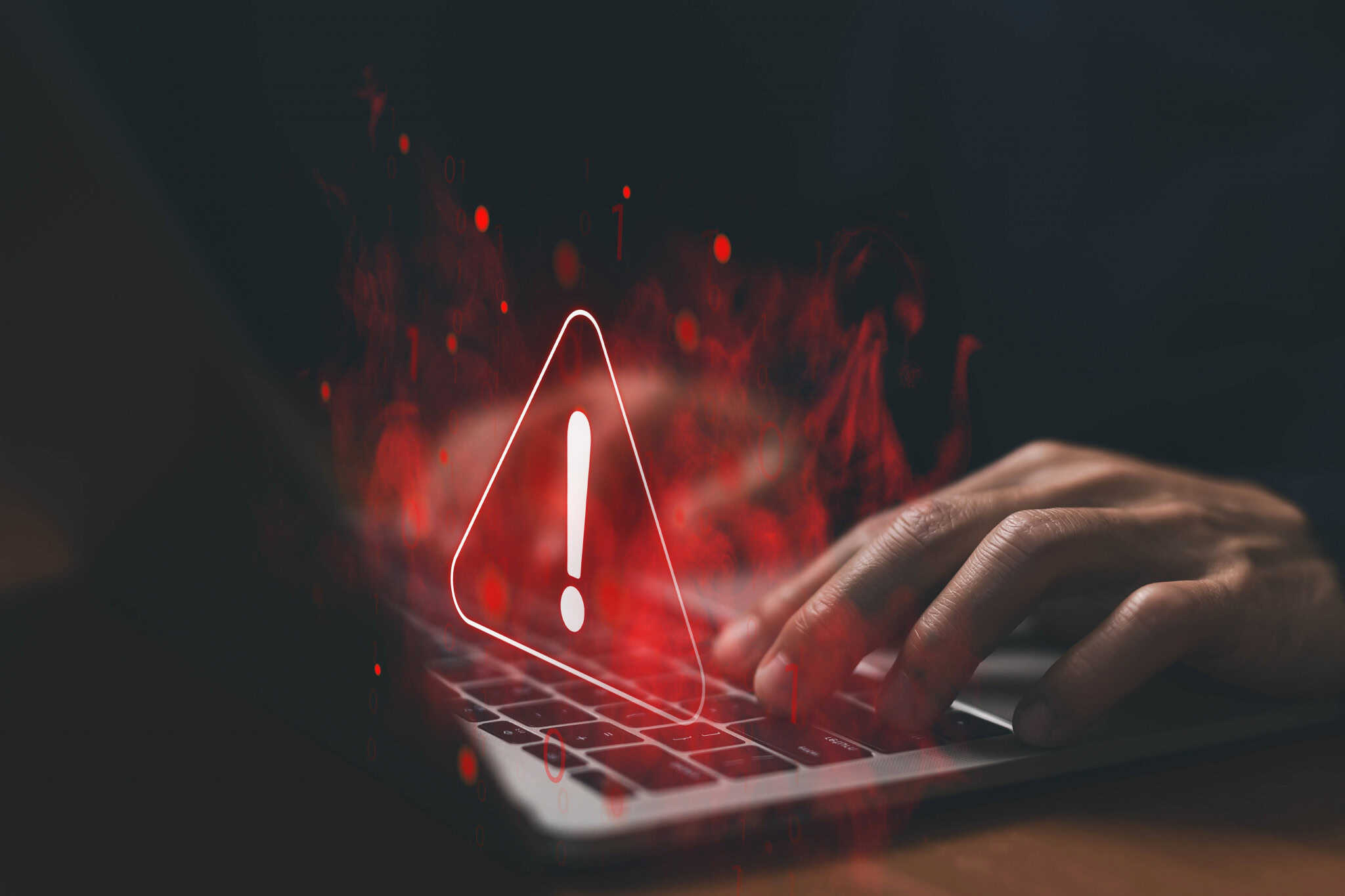Homem no computador sofrendo um ataque cibernético