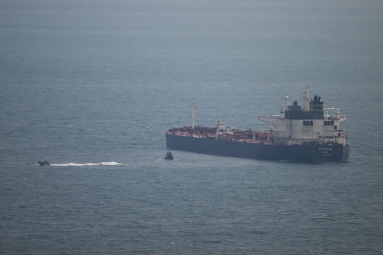An oil tanker operating as part of Russia’s shadow fleet is intercepted by British forces in the English Channel, in Portland, England, on June 15, 2026