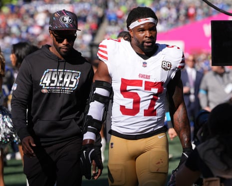 San Francisco 49ers linebacker Dre Greenlaw (57) leaves the field after being ejected on Sunday