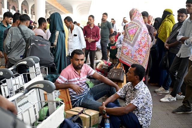 Saudi Arabia-bound passengers remain stranded at Hazrat Shahjalal airport in Dhaka on 12 October 2026 after their flights were cancelled a day after a Houthi strike at Riyadh airport