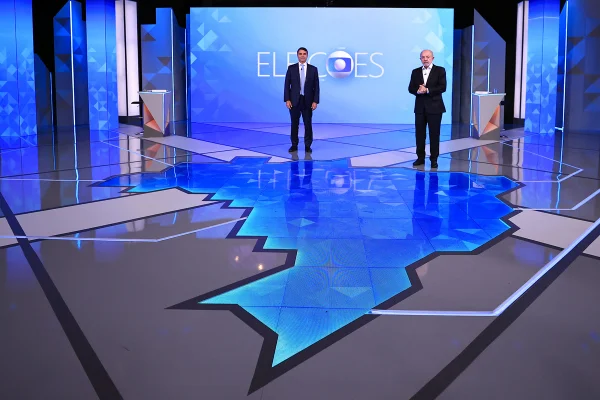 Lula e Flávio melhoraram na Globo, mas petista venceu no saldo de pontos